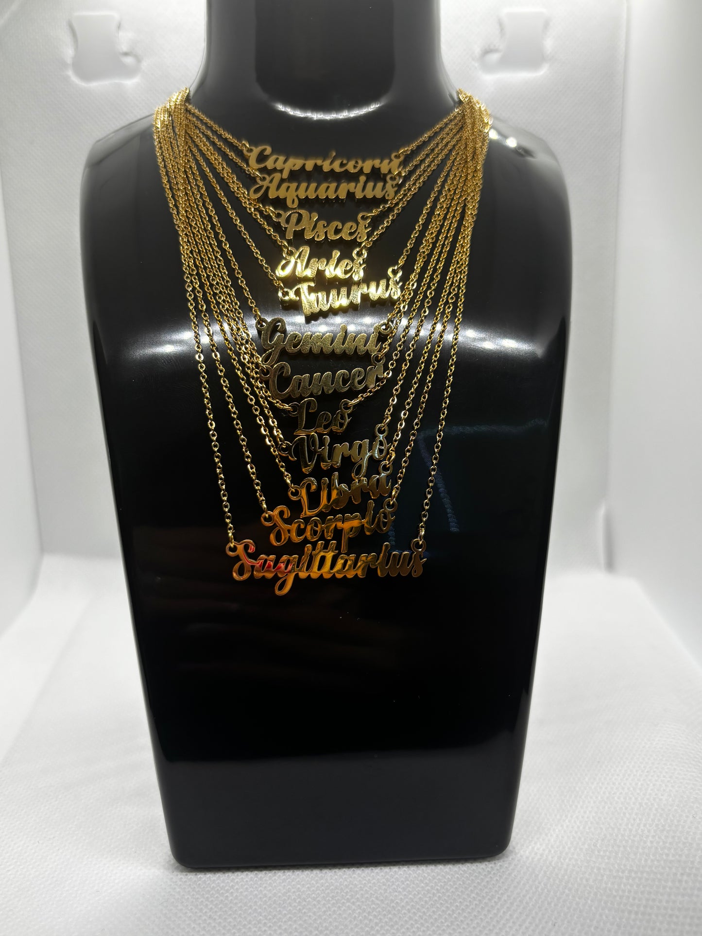 Ray’s Zodiac sign necklaces